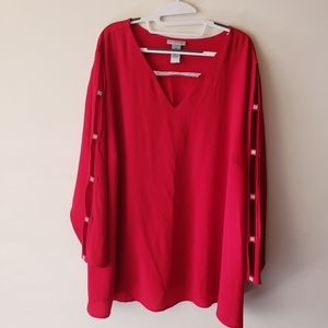 Womens red blouse with pearl caged sleeves